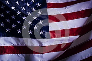 closeup shot of the waving flag of the United States of America with interesting textures