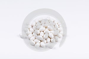 Closeup shot of white pharmaceuticals on a white background