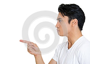 Closeup side profile portrait of serious man, pointing with index finger at someone, isolated on white background