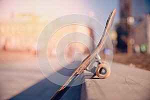 Closeup skateboard with sunlight. Concept freestyle extreme sports background