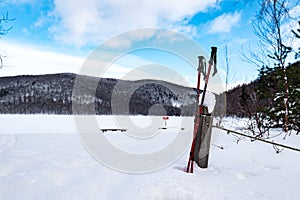 Closeup of ski poles in the ski resort of Saint-Hilaire, France