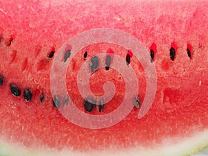 Closeup a slice of watermelon with seeds