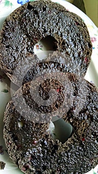 Closeup of a sliced bagel on a plate