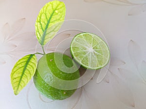 Closeup of sliced juicy green lemon