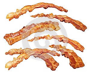 Closeup of slices of crispy hot fried bacon