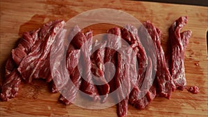 CloseUp: Slicing Beef into Strips on Wooden Board
