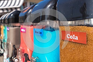 Closeup of Slush Machines with Colorful Flavors