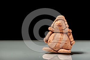 Small figurine made of clay by a child