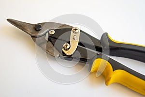 Closeup of small hand snippers or secateurs. Gardening tool. Isolated on white background.