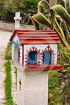 Closeup small Hellenic shrine Proskinitari, Greece