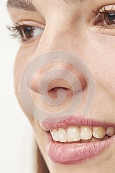 closeup of smile girl with white healthy teeth