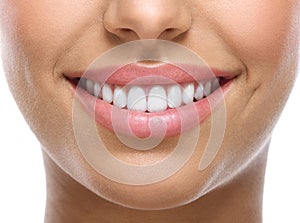 Closeup of smile with white teeth photo