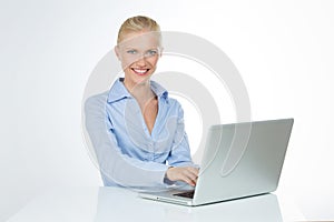 Closeup of smiling woman on white background