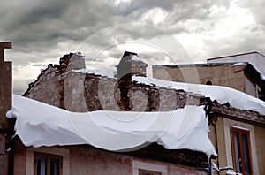 Closeup of snow accumulated on the edge of a roof