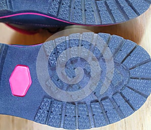 Closeup sole texture of  girly or female shoes. Bottom of blue pink shoe