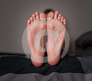 Closeup of the soles of female feet photo