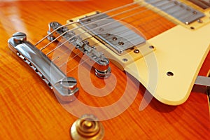 Closeup of solid body electric guitar. Detail, selective focus.