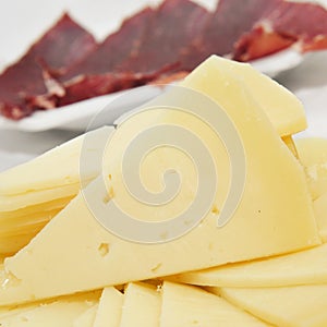 Spanish serrano ham and manchego cheese tapas photo