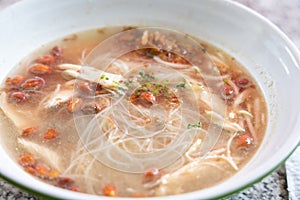 Closeup of Soto ayam bihun, popular Indonesian noodle soup in Malaysia