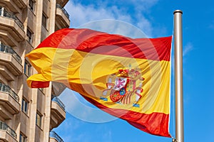 Spanish Flag Blowing in the Wind - Plaza de Espana Madrid Spain photo