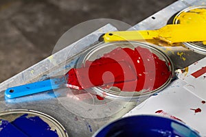 Closeup spatulas in color printing ink. CMYK