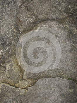 Closeup split, cracked layers of old masonry, limestone. facing plates in an architectural structure.