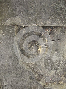 Closeup split, cracked layers of old masonry, limestone. facing plates in an architectural structure.