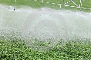 A closeup of sprinkler heads on an agricultural sprinkler