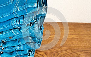 Closeup of stack of blue jeans