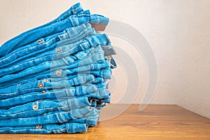 Closeup of stack of blue jeans