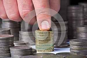Closeup of stack of british pound coins