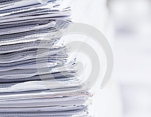 Closeup stack of newspaper