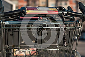 Closeup of stacked column shopping carts shot at the back.