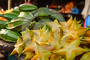 closeup of starfruits displayed at a roadside market