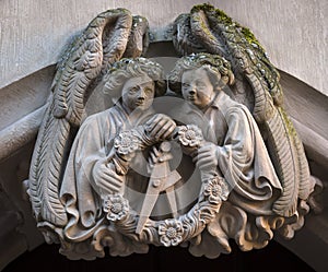 Closeup of statue angels in the ruins of Heidelberg Castle, Baden-Wurttemberg, Germany photo