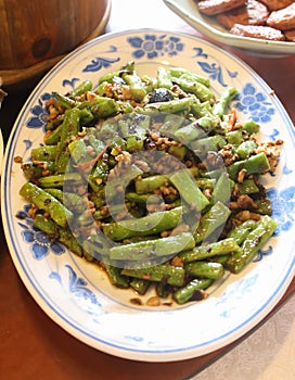 Closeup of Stir fried long beans chinese style on dish