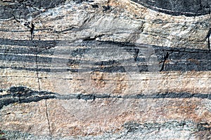 Closeup of a stone with different horizontal layers