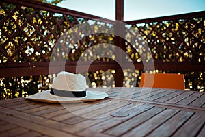 Closeup on straw hat on table in gazebo