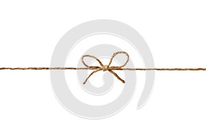 Closeup string or twine tied in a bow isolated on white