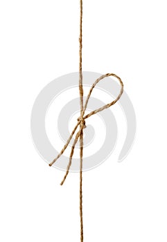 Closeup string or twine tied in a bow isolated on white