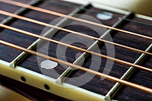 Closeup Of Strings And Fretboard Of Guitar
