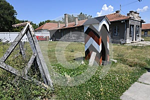 Closeup of a striped guardhouse outdoors on a sunny day