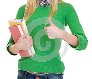 Closeup on student girl showing thumbs up