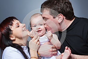 Closeup studio happy family portrait