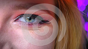Closeup of stunning eye makeup pink shadows beautifully drawn eyeline and toned eyebrow