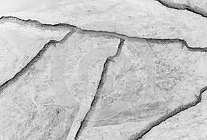 Closeup surface abstract marble pattern at the cracked marble stone floor texture background in black and white tone