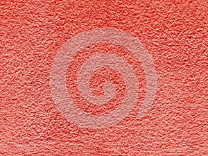 Closeup surface abstract pattern at old red painted cement wall textured background
