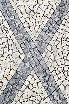 Closeup surface of blocky pattern old stone pavement