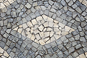 Closeup surface of blocky pattern old stone pavement