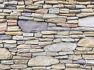 Closeup surface brick pattern at old stone brick wall textured background